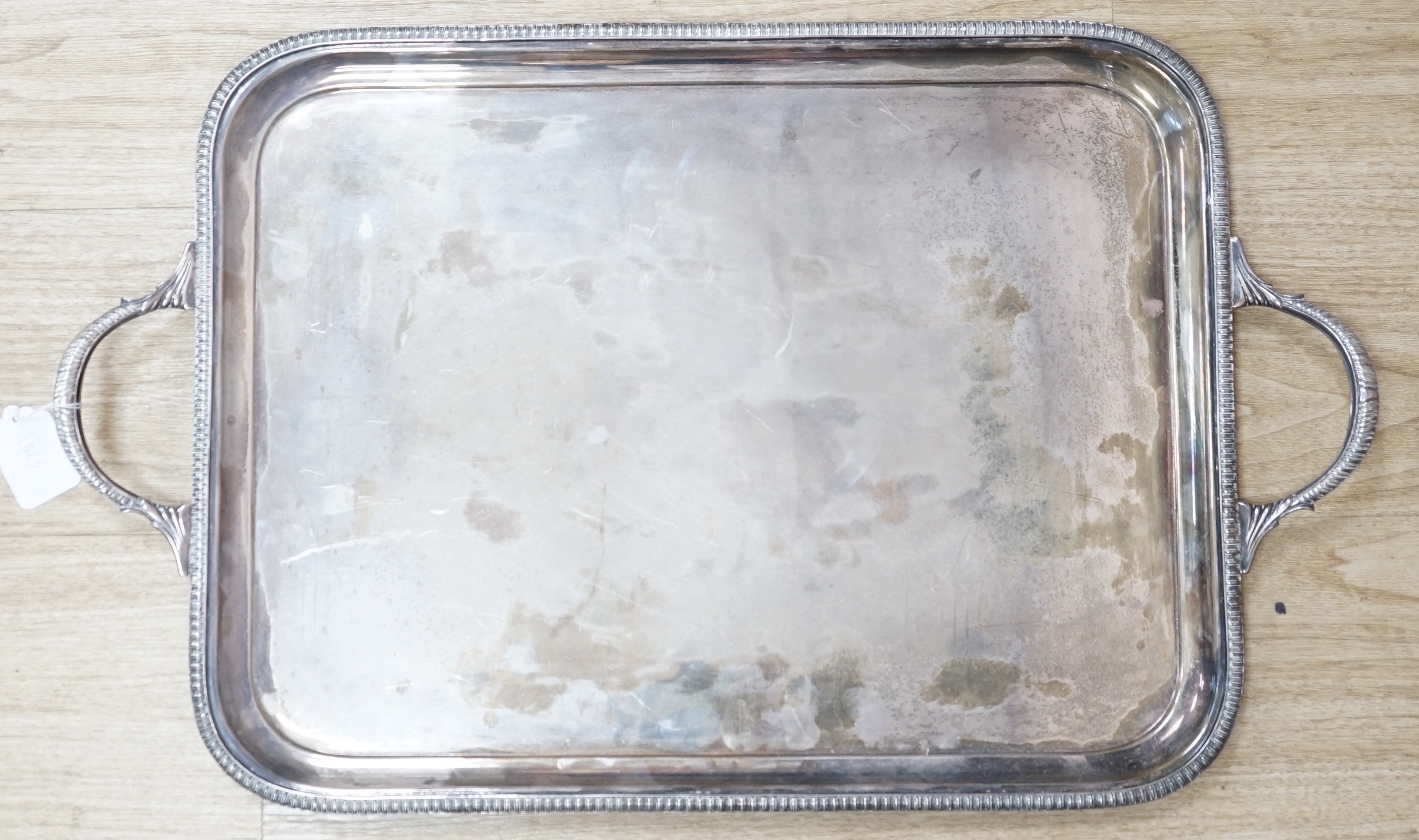 A Elizabeth II silver rectangular two handed tea tray, by James Dixon & Sons, Sheffield, 1958, 69cm, 109.1oz.